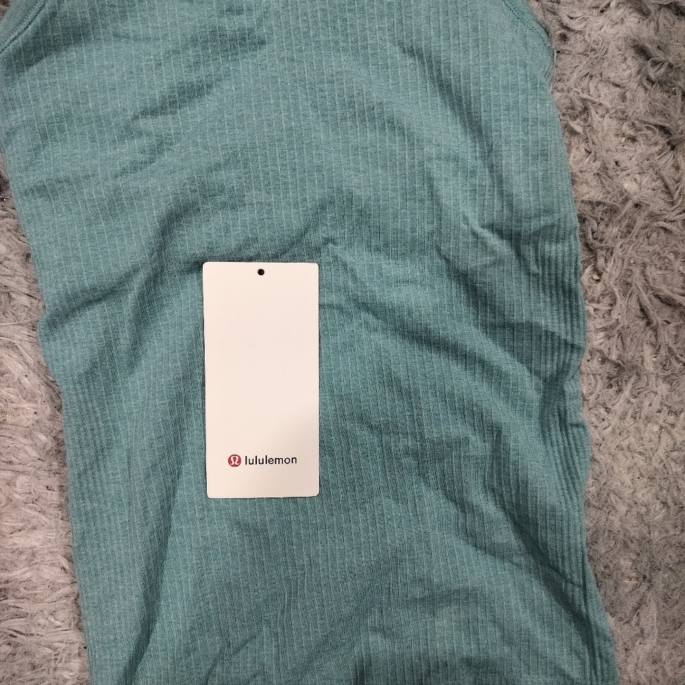Brand new with tag Lu LU lemon tag